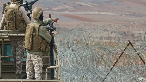 A picture taken during a tour origanized by the Jordanian Army shows soldiers patrolling along the border with Syria to prevent trafficking, on February 17, 2022. - Drug trafficking from Syria into Jordan is becoming "organised" with smugglers stepping up operations and using sophisticated equipment including drones, Jordan's army said, warning of a shoot-to-kill policy. Since the beginning of this year, Jordan's army has killed 30 smugglers and foiled attempts to smuggle into the kingdom from Syria 16 million Captagon pills -- more than they seized in the whole of 2021 -- the military said. (Photo by Khalil MAZRAAWI / AFP)