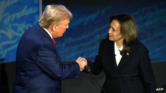 US Vice President and Democratic presidential candidate Kamala Harris (R) shakes hands with former US President and Republican presidential candidate Donald Trump during a presidential debate at the National Constitution Center in Philadelphia, Pennsylvania, on September 10, 2024. (Photo by SAUL LOEB / AFP)