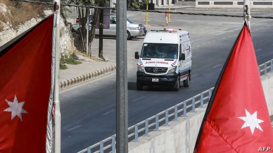 An ambulance drives along an empty road during a COVID-19 coronavirus lockdown in Jordan's capital Amman on October 9, 2020. (Photo by Khalil MAZRAAWI / AFP)