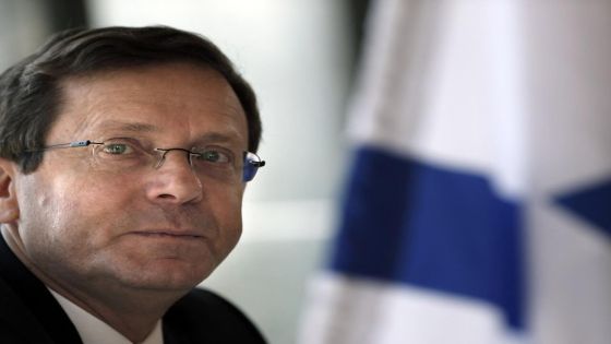 (FILES) In this file photo taken on February 10, 2016, Israeli co-leader of the Zionist Union party and Labour Party's leader Isaac Herzog (C) listens to journalists during a press conference at the Jerusalem Press Club. - Israel elected the even-keeled Labor veteran Isaac Herzog as its 11th president on June 2, 2021, a parliamentary vote that coincidentally fell as opposition lawmakers scrambled to forge a coalition to unseat Benjamin Netanyahu. (Photo by THOMAS COEX / AFP)