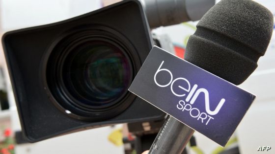 A microphone with the logo of recently launched French TV Sport channel BeIN Sport, that belongs to Qatari media group Al-Jazeera, is seen on June 7, 2012, during a press conference of the Euro 2012 football championships. AFP PHOTO / FRANCK FIFE (Photo by Franck FIFE / AFP)