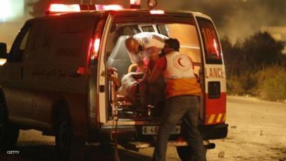 A Palestinian man is lifted into an ambulance during clashes with Israeli soldiers at the gates of the Beit El Jewish settlement in the Israel occupied West Bank near Ramallah on July 9, 2014, following a protest against the bombardment of the Gaza Strip by the Israeli air force. The Israeli air force bombed 160 targets in the Gaza Strip overnight as it pressed a wide scale campaign to stop volleys of Palestinian rocket fire, an army official said. AFP PHOTO / ABBAS MOMANI (Photo credit should read ABBAS MOMANI/AFP/Getty Images)