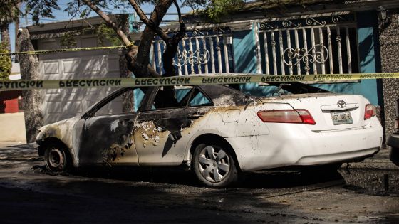 epa12770367 A burning vehicle is seen in Tijuana, Mexico, 22 February 2026. The Mexican Ministry of National Defense confirms the death of Nemesio Ruben Oseguera Cervantes, known as El Mencho, leader of the Jalisco New Generation Cartel, prompting roadblocks and vehicle burnings by the criminal group. EPA/Joebeth Terriquez