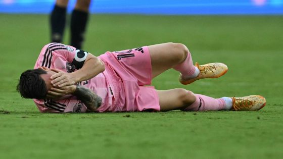 Inter Miami's Argentine forward #10 Lionel Messi falls after colliding with Philadelphia's Colombian defender #02 Geiner Martinez during the Major League Soccer (MLS) regular season football match between Inter Miami CF and Philadelphia Union at Nu Stadium in Miami, Florida, on May 24, 2026. (Photo by CHANDAN KHANNA / AFP)