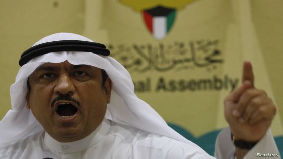 Kuwaiti lawmaker Musallam al-Barrak gestures while speaking to journalists at Parliament's media center in Kuwait City November 20, 2011. Today marked the first working day after the Parliament building was stormed by protesters demanding resignation of Kuwait's Prime Minister Sheikh Nasser al-Mohammad al-Sabah. REUTERS/Hamad I Mohammed (KUWAIT - Tags: CIVIL UNREST POLITICS)