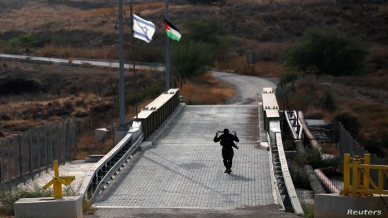 An Israeli soldier patrols the border area between Israel and Jordan at Naharayim, as seen from the Israeli side October 22, 2018. REUTERS/ Ronen Zvulun