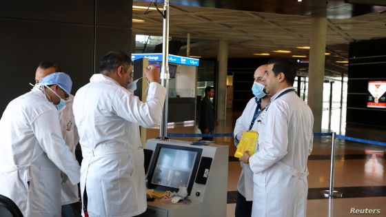 Medical staff wear protective gear before checked passengers by thermal scanners for coronavirus symptoms at Queen Alia International Airport in Amman, Jordan March 4, 2020.REUTERS/Muhammad Hamed