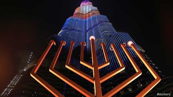 A giant menorah is lit up to celebrate Hanukkah, the Jewish festival of lights, in Dubai, United Arab Emirates December 10, 2020. REUTERS/Christopher Pike