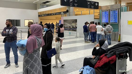 Passengers wait with their belongings at a hall at Beirut international airport in Beirut, Lebanon November 12, 2021. REUTERS/Mohamed Azakir