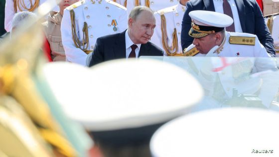 Russia's President Vladimir Putin speaks with Russian Navy Commander-in-Chief Admiral Alexander Moiseyev during the annual Navy Day parade in Saint Petersburg, Russia July 28, 2024. Sputnik/Sergei Savostyanov/Pool via REUTERS ATTENTION EDITORS - THIS IMAGE WAS PROVIDED BY A THIRD PARTY.