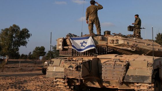 Israeli tanks are seen in the aftermath of a mass infiltration by Hamas gunmen from the Gaza Strip, in Kibbutz Beeri in southern Israel, October 14, 2023. REUTERS/Violeta Santos Moura