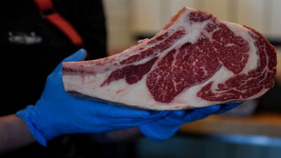 DENVER, CO - MARCH 26: Amanda Demo, general manager of Western Daughter's Butcher Shoppe, arranges beef in a display refrigerator before opening on Thursday, March 26, 2020. The shop, located in the Highlands, is working with local farmers and ranchers who've been selling to restaurants and are now scrambling to find new customers, including through individual customers. (Photo by AAron Ontiveroz/MediaNews Group/The Denver Post via Getty Images)