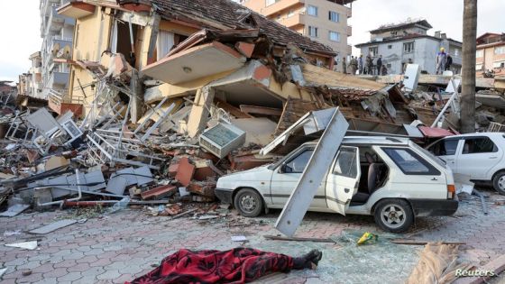 SENSITIVE MATERIAL. THIS IMAGE MAY OFFEND OR DISTURB A dead body lies on the ground near rubbles, following an earthquake in Hatay Province, Turkey, February 7, 2023. REUTERS/Umit Bektas TPX IMAGES OF THE DAY