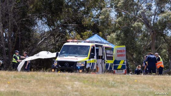 Emergency services personnel work on scene at Hillcrest Primary School after strong winds lifted an inflated jumping castle into the air, in Devonport, Tasmania, December 16, 2021. Four children were killed and several more badly injured after strong winds lifted the inflated jumping castle into the air during end-of-year school celebrations, causing them to fall 10 meters (33 feet), authorities said on Thursday, prompting an outpouring of grief. AAP Image/Grant Wells via REUTERS ATTENTION EDITORS - THIS IMAGE WAS PROVIDED BY A THIRD PARTY. NO RESALES. NO ARCHIVE. AUSTRALIA OUT. NEW ZEALAND OUT