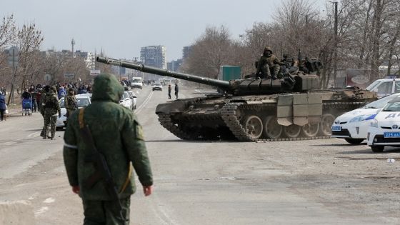 Service members of pro-Russian troops are seen atop of a tank during Ukraine-Russia conflict on the outskirts of the besieged southern port city of Mariupol, Ukraine March 20, 2022. REUTERS/Alexander Ermochenko