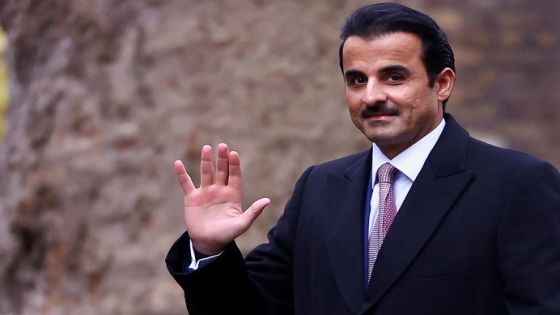 Qatar's Emir Sheikh Tamim bin Hamad al-Thani waves as he walks to meet British Prime Minister Keir Starmer at Downing Street, in London, Britain, December 4, 2024. REUTERS/Hannah McKay