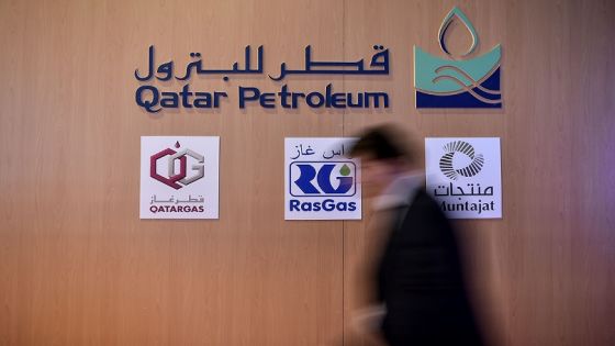 A man walks past the Qatar petroleum stand on July 11, 2017 during 22nd World Petroleum Congress in Istanbul. Oil major bosses and energy ministers are meeting at the World Petroleum Congress in Istanbul, with the outlook clouded by the low price of crude oil, currently trading at around 45 dollars a barrel compared with a peak of over 145 dollars in 2008. / AFP PHOTO / OZAN KOSE (Photo credit should read OZAN KOSE/AFP/Getty Images)