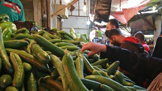 A woman buys fresh vegetables at a market ahead of the Muslim holy month of Ramadan, during the novel coronavirus pandemic crisis in the Jordanian capital Amman, on April 23, 2020. (Photo by Khalil MAZRAAWI / AFP) (Photo by KHALIL MAZRAAWI/AFP via Getty Images)