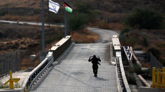 An Israeli soldier patrols the border area between Israel and Jordan at Naharayim, as seen from the Israeli side October 22, 2018. REUTERS/ Ronen Zvulun