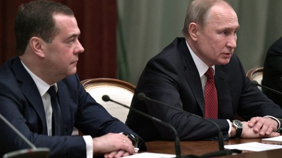 FILE PHOTO: Russian President Vladimir Putin and Prime Minister Dmitry Medvedev attend a meeting with members of the government in Moscow, Russia January 15, 2020. Sputnik/Alexey Nikolsky/Kremlin via REUTERS ATTENTION EDITORS - THIS IMAGE WAS PROVIDED BY A THIRD PARTY./File Photo