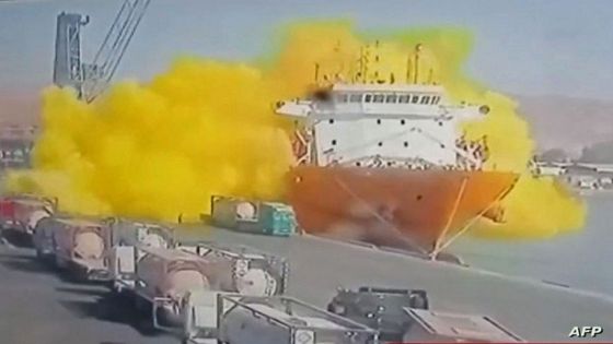 This image grab taken from a CCTV footage broadcasted by Jordan's Al-Mamlaka TV on June 27, 2022 shows the moment of a toxic gas explosion in Jordan's Aqaba port. - Footage on state TV showed a large cylinder plunging from a crane on a moored vessel, causing a violent explosion of yellow gas. The government spokesman urged citizens not to approach the site of the accident, adding that medical reinforcements were being sent to Aqaba. (Photo by various sources / AFP) / RESTRICTED TO EDITORIAL USE - MANDATORY CREDIT "AFP PHOTO /AL MAMLAKA TV " - NO MARKETING - NO ADVERTISING CAMPAIGNS - DISTRIBUTED AS A SERVICE TO CLIENTS