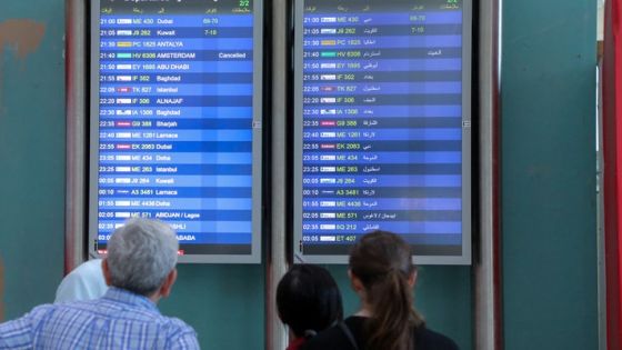 People look at flight information boards at the Beirut–Rafic Hariri International Airport, in Beirut, Lebanon July 28, 2024. REUTERS/Mohamed Azakir