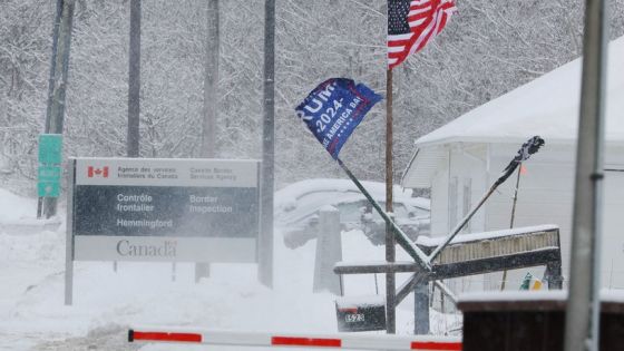 An American flag and a campaign flag for U.S. President Donald Trump flutter from a private residence between the Canada and U.S. border in Mooers Forks, New York, U.S., February 4, 2025. REUTERS/Brian Snyder 