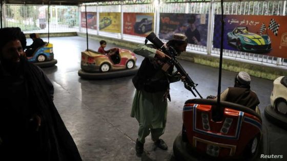 Taliban soldiers ride bumper cars at an amusement park in Kabul, Afghanistan, September 13, 2021. WANA (West Asia News Agency) via REUTERS ATTENTION EDITORS - THIS IMAGE HAS BEEN SUPPLIED BY A THIRD PARTY.