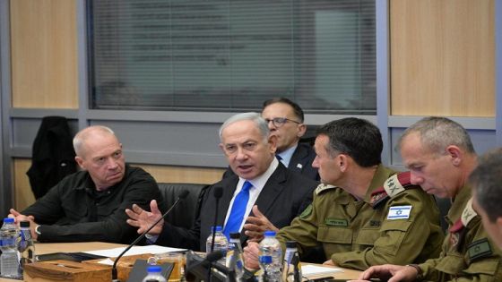 HANDOUT - 09 October 2023, Israel, Tel Aviv: Israeli Prime Minister Benjamin Netanyahu (C) and Minister of Defence Yoav Gallant (L) hold a security assessment at the Kirya in Tel Aviv. Photo: Amos Ben-Gershom/GPO/dpa - ATTENTION: editorial use only and only if the credit mentioned above is referenced in full