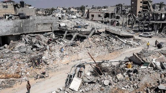 CORRECTION / A man stands by the rubble of a destroyed building in Khan Yunis on April 7, 2024 after Israel pulled its ground forces out of the southern Gaza Strip, six months into the devastating war sparked by the October 7 attacks. Israel pulled all its troops out of southern Gaza on April 7, including from the city of Khan Yunis, the military and Israeli media said, after months of fierce fighting with Hamas militants left the area devastated. (Photo by AFP) / The erroneous mention[s] appearing in the metadata of this photo by - has been modified in AFP systems in the following manner: [Khan Yunis] instead of [Rafah]. Please immediately remove the erroneous mention[s] from all your online services and delete it (them) from your servers. If you have been authorized by AFP to distribute it (them) to third parties, please ensure that the same actions are carried out by them. Failure to promptly comply with these instructions will entail liability on your part for any continued or post notification usage. Therefore we thank you very much for all your attention and prompt action. We are sorry for the inconvenience this notification may cause and remain at your disposal for any further information you may require.