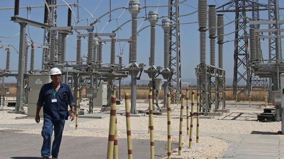 A worker walks at the site where a new electricity plant will be built in Jalamah, near the West Bank town of Jenin, following the signing of a new contract on July 10, 2017.
Israel Energy Minister Yuval Steinitz made a rare appearance by a high-ranking Israeli official in the occupied West Bank to sign the agreement on electricity with the Palestinian Authority. / AFP PHOTO / JAAFAR ASHTIYEH (Photo credit should read JAAFAR ASHTIYEH/AFP via Getty Images)