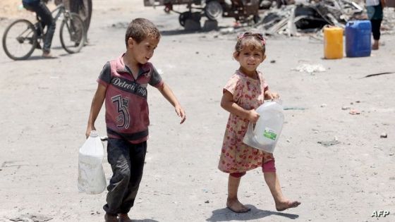 Palestinian children carry water containers in the Jabalia refugee camp, in the northern Gaza Strip on June 3, 2024, amid the ongoing conflict between Israel and the Palestinian Hamas militant group. (Photo by Omar Al Qatta / AFP)