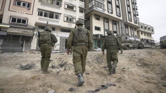 Israeli soldiers are seen during a ground operation in the Gaza Strip, Wednesday, Nov. 22, 2023. (AP Photo/Victor R. Caivano)
