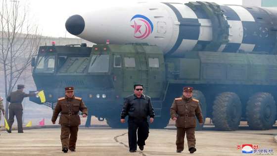 North Korean leader Kim Jong Un walks away from what state media report is a "new type" of intercontinental ballistic missile (ICBM) in this undated photo released on March 24, 2022 by North Korea's Korean Central News Agency (KCNA). KCNA via REUTERS ATTENTION EDITORS - THIS IMAGE WAS PROVIDED BY A THIRD PARTY. REUTERS IS UNABLE TO INDEPENDENTLY VERIFY THIS IMAGE. NO THIRD PARTY SALES. SOUTH KOREA OUT. NO COMMERCIAL OR EDITORIAL SALES IN SOUTH KOREA. TPX IMAGES OF THE DAY