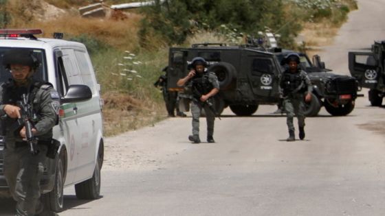 Members of Israeli border police patrol near the scene of a security incident at an Israeli military base near Jenin in the Israeli-occupied West Bank, May 7, 2021. REUTERS/Raneen Sawafta