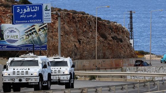 United Nations peacekeeping force (UNIFIL) vehicles patrol the coastal road to Naqura, the southernmost Lebanese town by the border with Israel, on October 13, 2020. - Lebanon and Israel, which are still technically at war, had agreed to begin UN-brokered negotiations on October 14 over the shared frontier, a particularly sensitive issue as Lebanon wants to drill for hydrocarbons in a part of the Mediterranean disputed by Israel. (Photo by Mahmoud ZAYYAT / AFP)