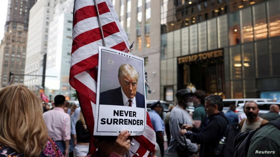 Trump supporters stand outside Trump Tower following the announcement of the verdict in former U.S. President Donald Trump's criminal trial over charges that he falsified business records to conceal money paid to silence porn star Stormy Daniels in 2016, in New York City, U.S. May 30, 2024. REUTERS/Andrew Kelly