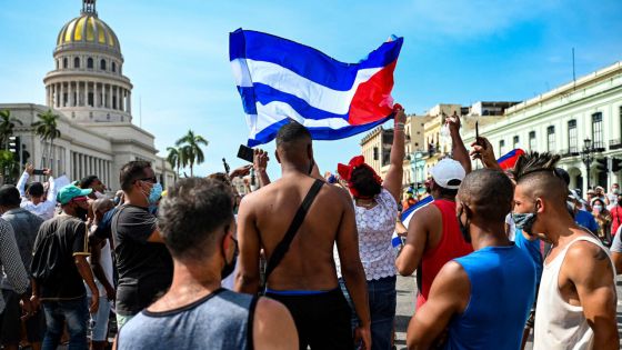 People take part in a demonstration against the government of Cuban President Miguel Diaz-Canel in Havana, on July 11, 2021. Thousands of Cubans took part in rare protests Sunday against the communist government, marching through a town chanting "Down with the dictatorship" and "We want liberty."
