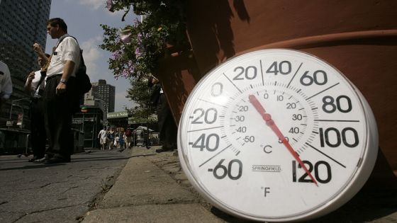 NEW YORK - AUGUST 02: A thermometer in the sun on the sidewalk indicates a temperature of 120 degrees Fahrenheit as people eat ice cream on the Upper West Side August 2, 2006 in New York City. Forecasters have called for high temperatures of 100 degrees in the city with the heat wave continuing through tomorrow. (Photo by Chris Hondros/Getty Images)