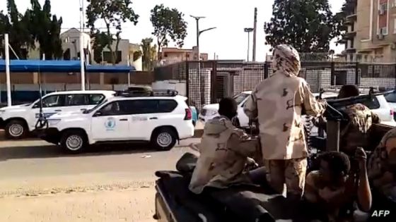 A grab taken from an AFPTV video shows a convoy leaving Khartoum towards Port Sudan, on April 23, 2023, as people flee the battle-torn Sudanese capital. (Photo by Abubakarr JALLOH / AFP)