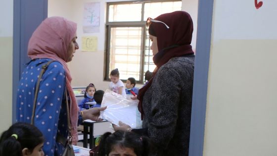 AMMAN, JORDAN- SEPTEMBER 1: More than two million male and female Jordanian students joined the academic school year 2020/2021, Tuesday, after five months staying at their homes, on September 01, 2020 in Amman, Jordan. With pandemic precautions, students will study in schools and remotely under measures to be covered by health requirements and procedures that maintain the safety of children, as children will enter directly into the classroom and with the presence of teachers to practice keeping distances, children will not be allowed to stay in the schools’ yards under teachers’ supervision, and in order to ensure physical distancing children of the same class will be divided into two groups directly in classrooms and within the limits permitted in the health protocol, with an emphasis that there is no morning queue or activities that allow mixing in schools, according to a statement of the ministry, among other measures that allow the direct closure of schools at infected areas in the cities. (Photo by Jordan Pix/Getty Images)