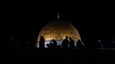epaselect epa05402718 Palestinian Muslims gather to pray during the Laylat Al Qadr (Night of Destiny) outside of the Dome of the Rock at al-Aqsa Mosque in the old city of Jerusalem, 02 July 2016. In Islamic belief Laylat Al Qadr, one of the holiest nights in the holy Muslim month of Ramadan, marks the night when the first verses of the Quran were revealed to the Prophet Muhammad. EPA/ALAA BADARNEH