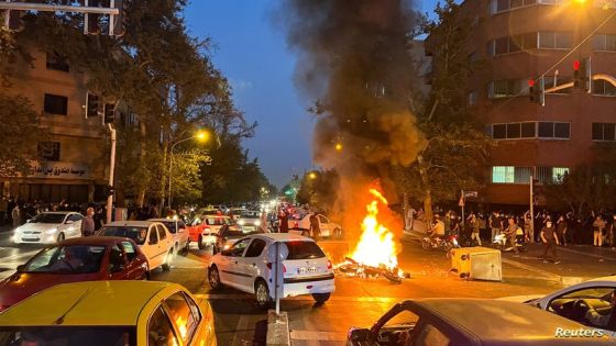 FILE PHOTO: A police motorcycle burns during a protest over the death of Mahsa Amini, a woman who died after being arrested by the Islamic republic's "morality police", in Tehran, Iran September 19, 2022. WANA (West Asia News Agency) via REUTERS ATTENTION EDITORS - THIS IMAGE HAS BEEN SUPPLIED BY A THIRD PARTY. ATTENTION EDITORS - THIS PICTURE WAS PROVIDED BY A THIRD PARTY/File Photo