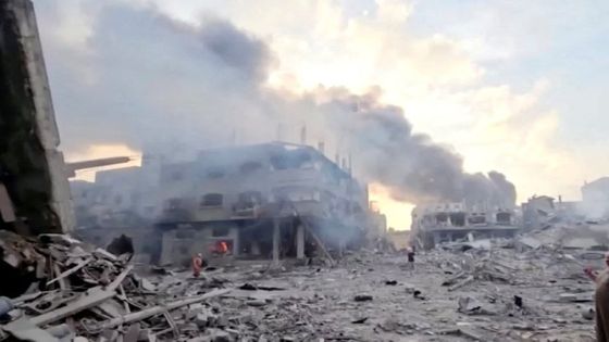 FILE PHOTO: People survey the destruction at Gaza's Jabalia refugee camp, following Israeli strikes on the enclave, October 14, 2023 in this still image from video obtained by REUTERS/File Photo ATTENTION EDITORS - THIS IMAGE HAS BEEN SUPPLIED BY A THIRD PARTY.