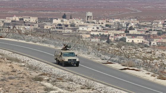 A picture taken during a tour origanized by the Jordanian Army shows soldiers patrolling along the border with Syria to prevent trafficking, on February 17, 2022. Drug trafficking from Syria into Jordan is becoming "organised" with smugglers stepping up operations and using sophisticated equipment including drones, Jordan's army said, warning of a shoot-to-kill policy. Since the beginning of this year, Jordan's army has killed 30 smugglers and foiled attempts to smuggle into the kingdom from Syria 16 million Captagon pills -- more than they seized in the whole of 2021 -- the military said. (Photo by Khalil MAZRAAWI / AFP)