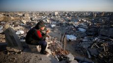 A Palestinian looks on as the rubble of destroyed buildings is seen at Jabalia refugee camp, northern Gaza Strip, February 26, 2025. REUTERS/Mahmoud Issa TPX IMAGES OF THE DAY