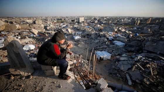 A Palestinian looks on as the rubble of destroyed buildings is seen at Jabalia refugee camp, northern Gaza Strip, February 26, 2025. REUTERS/Mahmoud Issa TPX IMAGES OF THE DAY