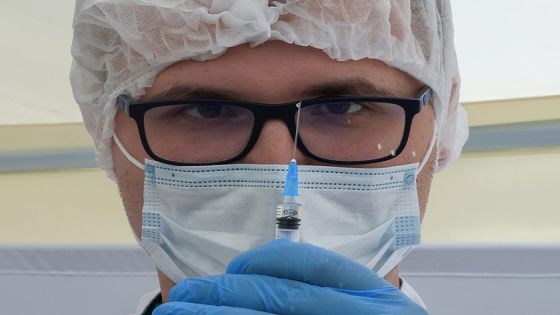 FILE PHOTO: A healthcare worker holds a syringe with the one-dose Sputnik Light vaccine against the coronavirus disease (COVID-19) in a vaccination centre at a city market in Moscow, Russia, June 30, 2021. REUTERS/Tatyana Makeyeva/File Photo