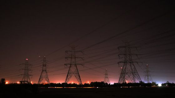 A general view taken on May 11, 2015 shows high voltage electricity towers in Kuwait City. Kuwait has increased its electricity production capacity this year in anticipation of the summer season, when consumption is expected to sour in parallel with the rising temperatures. AFP PHOTO / YASSER AL-ZAYYAT / AFP PHOTO / YASSER AL-ZAYYAT