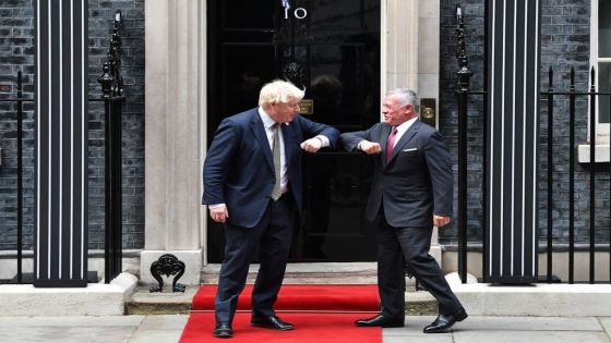 Britain's Prime Minister Boris Johnson (L) welcomes His Majesty King Abdullah II, King of Jordan outside Number 10 Downing Street in central London on October 28, 2021. (Photo by JUSTIN TALLIS / AFP) (Photo by JUSTIN TALLIS/AFP via Getty Images)